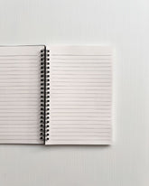 Galaxies in a jar - Black Cover With White Lined Pages